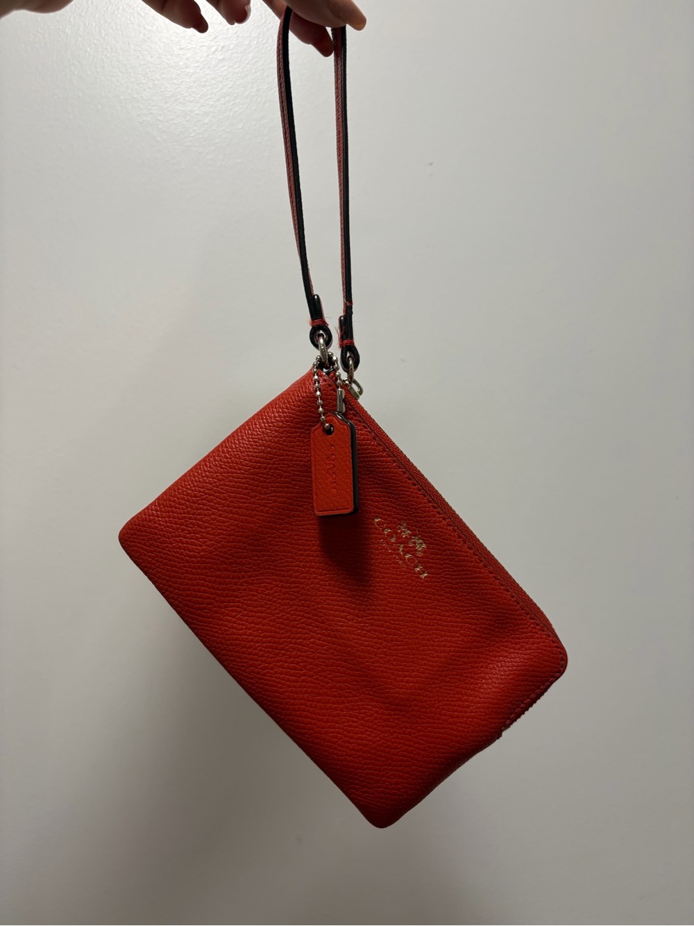 Coach Orange-Red Pebbled Leather Wristlet
